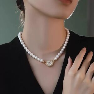 Elegant Pearl Necklace with Gold Accents